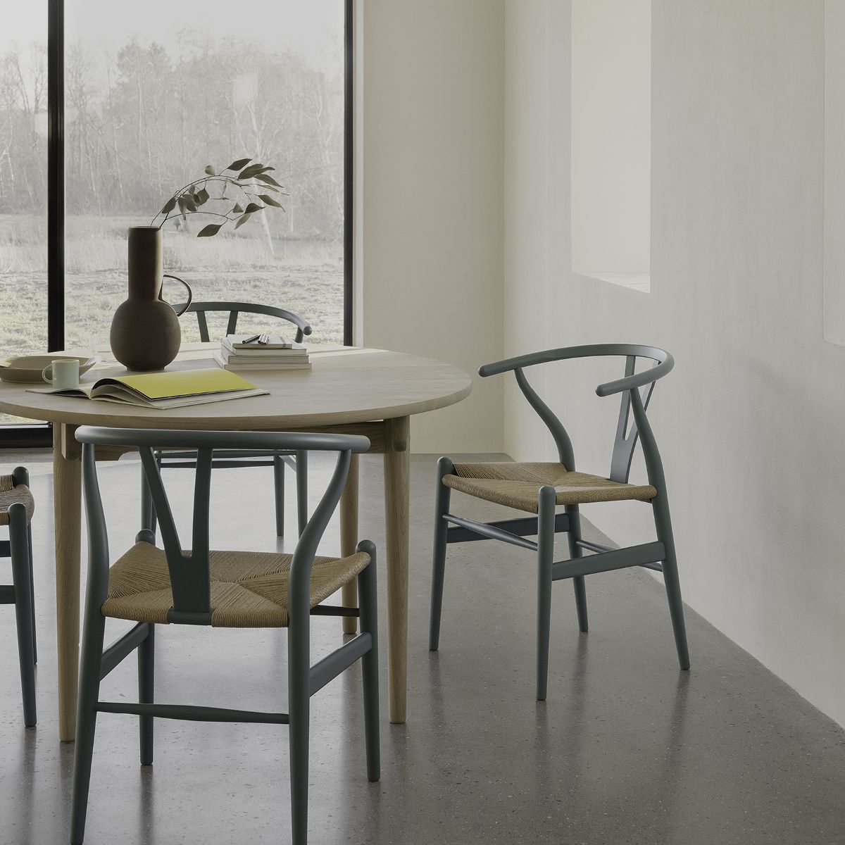 https://www.fjorn.com/cdn/shop/products/special-edition-hans-wegner-ch24-wishbone-chair-ilse-crawford-matte-pewter-natural-paper-cord-seat-march-2022-134.jpg?v=1649366400